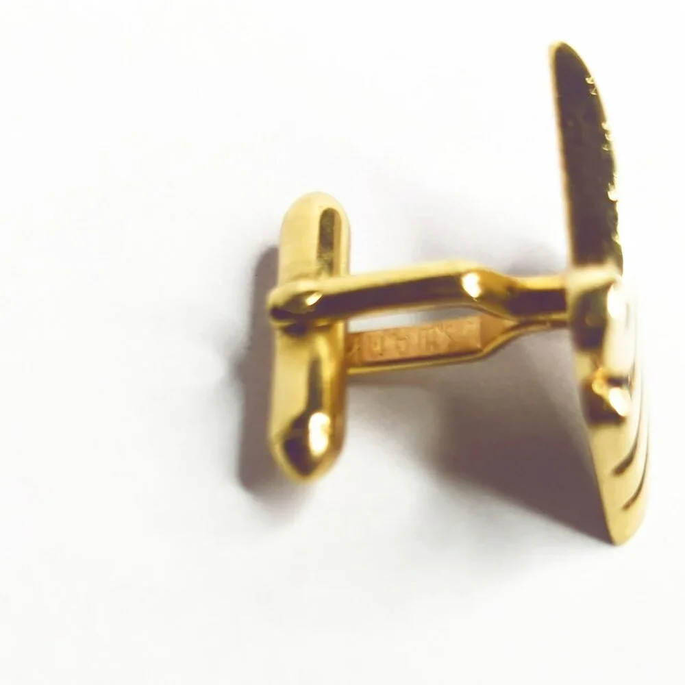 Vintage Swank Gold Tone Cufflinks With Modernist Scroll Design